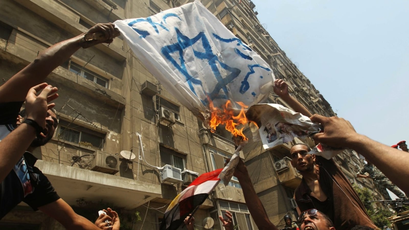 articles/2012/03/08/is-there-any-conspiracy-jews-aren-t-involved-in/israel-protest_or7r6n