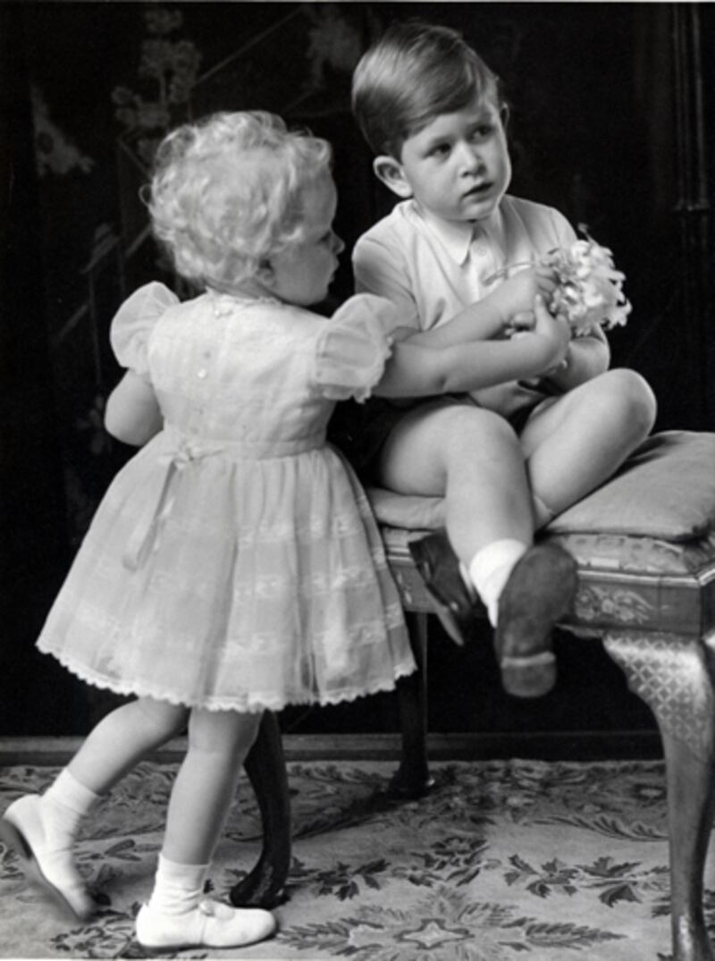 articles/2012/03/23/unseen-photos-of-queen-and-family-from-march-1952/prince-charles-princess-anne-3-portrait-royalist-sykes_s8c2cy