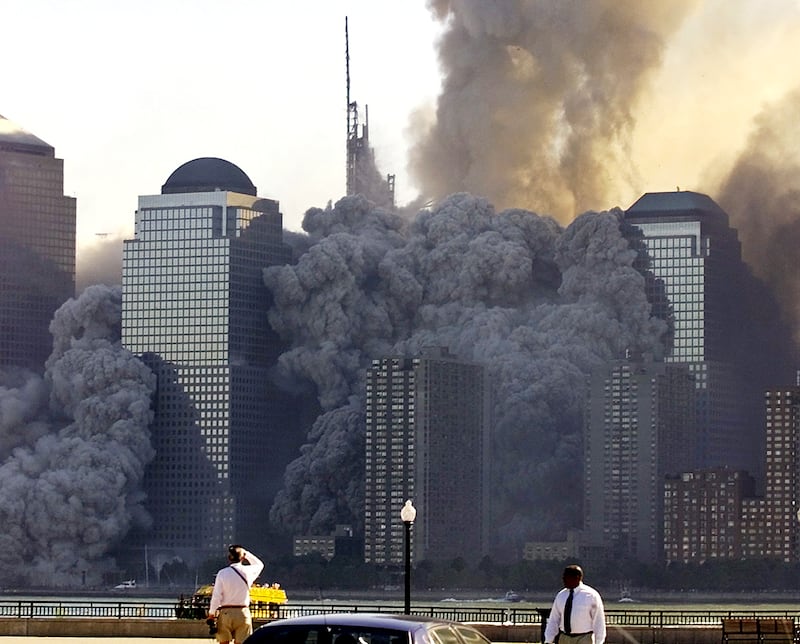 The remaining tower of New York's World Trade Center dissolves in a cloud of dust and debris about a half hour after the
first twin tower collapsed.