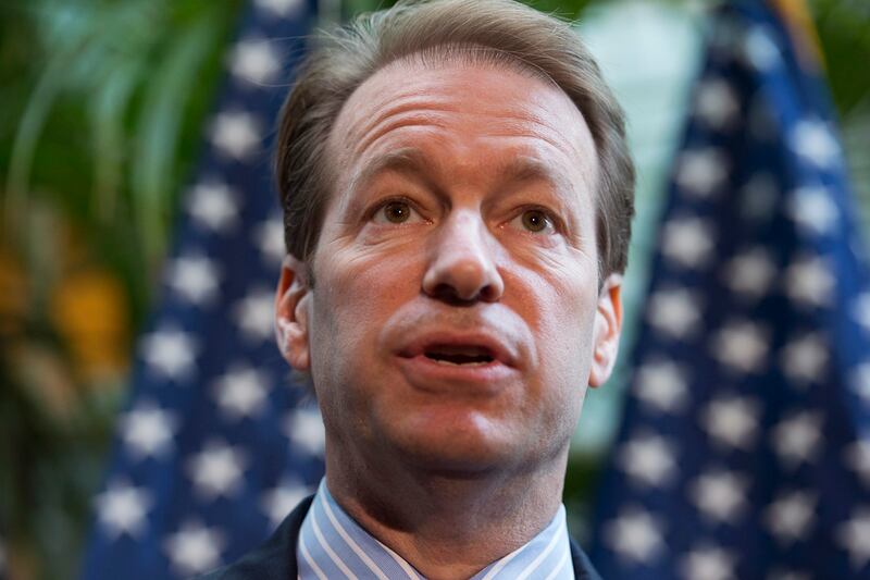 articles/2012/12/10/peter-roskam-obama-s-republican-buddy/obama-roskam-warren_gbnkqh