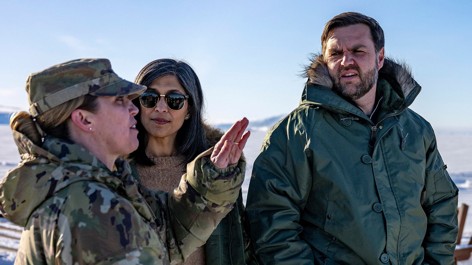 Vice President JD Vance and his wife Usha Vance tour Pituffik Space Base accompanied by two officers.