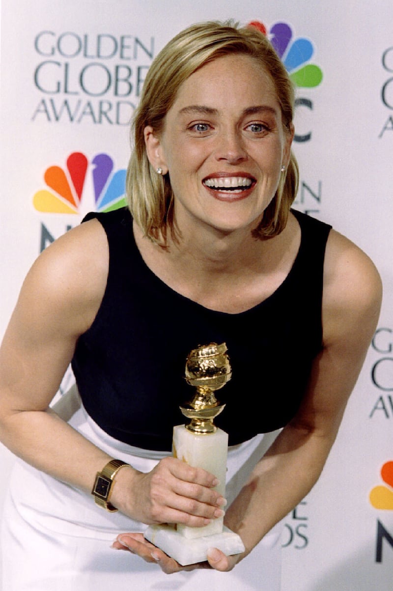 Sharon Stone shows off the Golden Globe award for Best Actress in a Motion Picture drama for her work in "Casino" January 21 at the 53rd Annual Golden Globe Awards