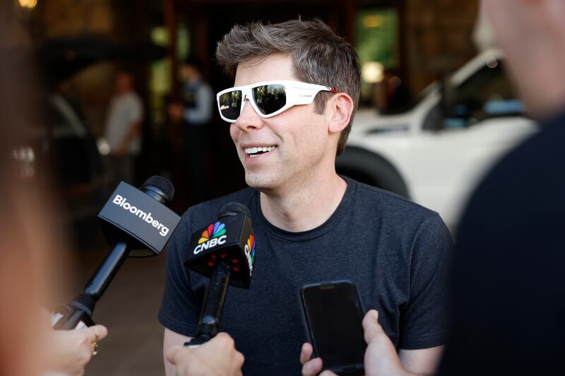 OpenAI CEO Sam Altman looked extra professional as he chatted with reporters in a grey-black t-shirt.