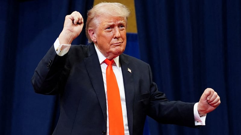 U.S. President Donald Trump dances as he departs an event at The Villages Charter School at The Villages, Florida, U.S., May 1, 2026. REUTERS/Nathan Howard