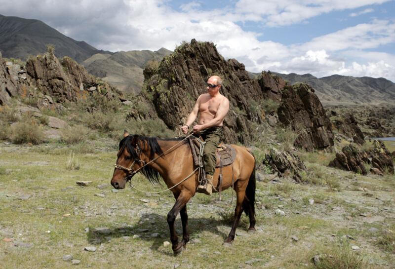 galleries/2012/04/10/obama-s-push-ups-from-sarkozy-biking-to-cameron-running-more-world-leaders-working-out-photos/world-leader-workouts-putin_dzqfg1