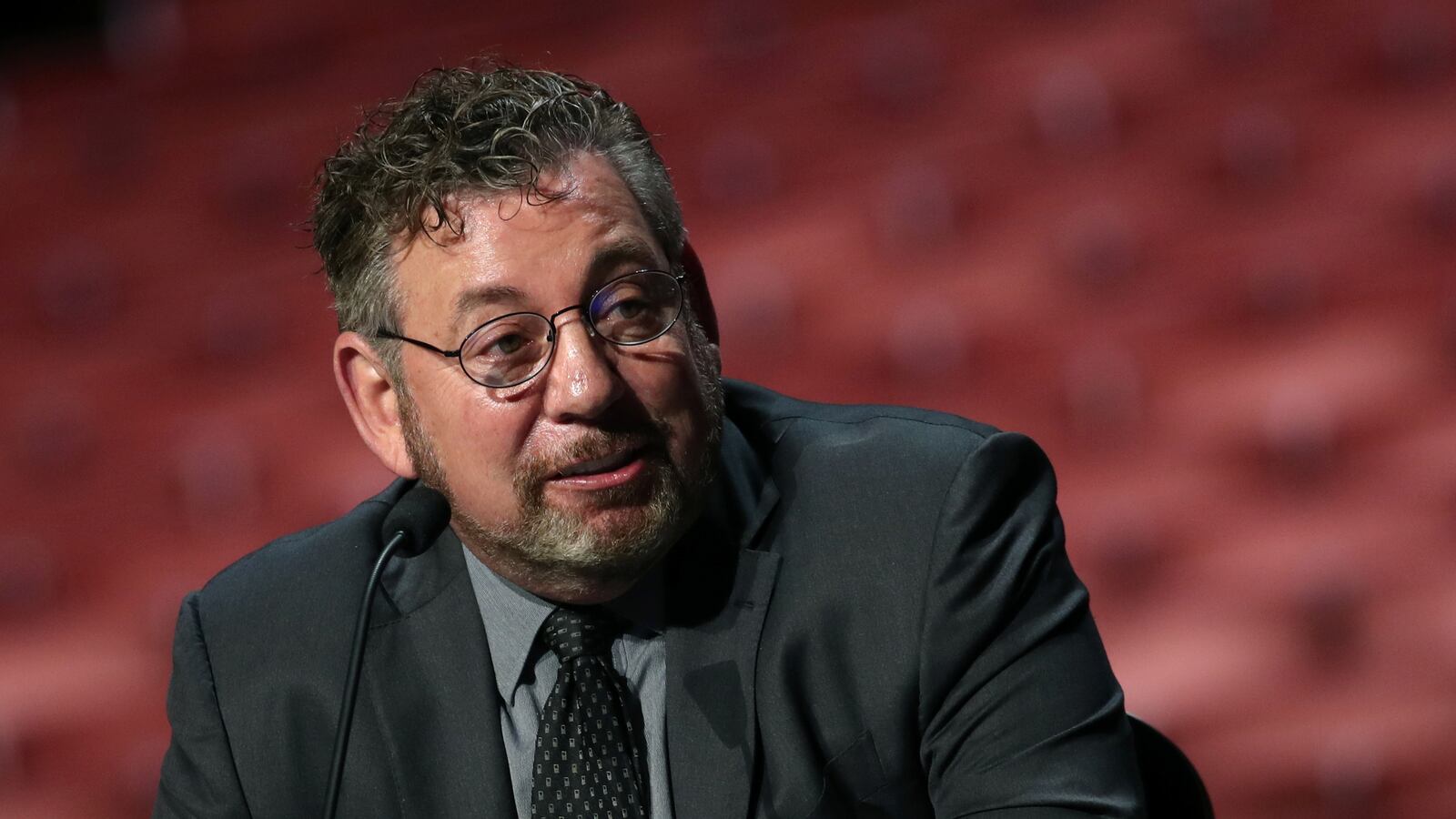 James Dolan speaks at a news conference.