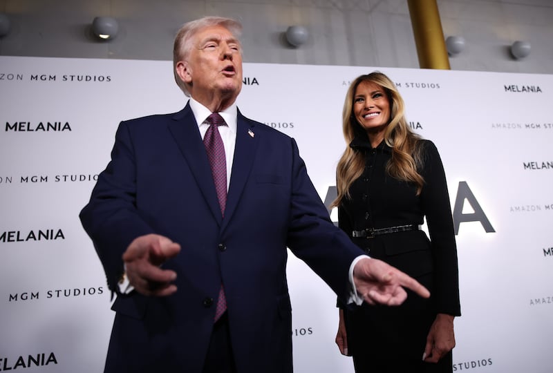 WASHINGTON, DC - JANUARY 29: U.S. President Donald Trump and first lady Melania Trump attend a screening of the documentary film “Melania” at The Kennedy Center on January 29, 2026 in Washington, DC. “Melania” was directed by Brett Ratner, and Amazon paid $40 million to license the film, which follows the first lady in the twenty days before her return to the White House. (Photo by Samuel Corum/Getty Images)