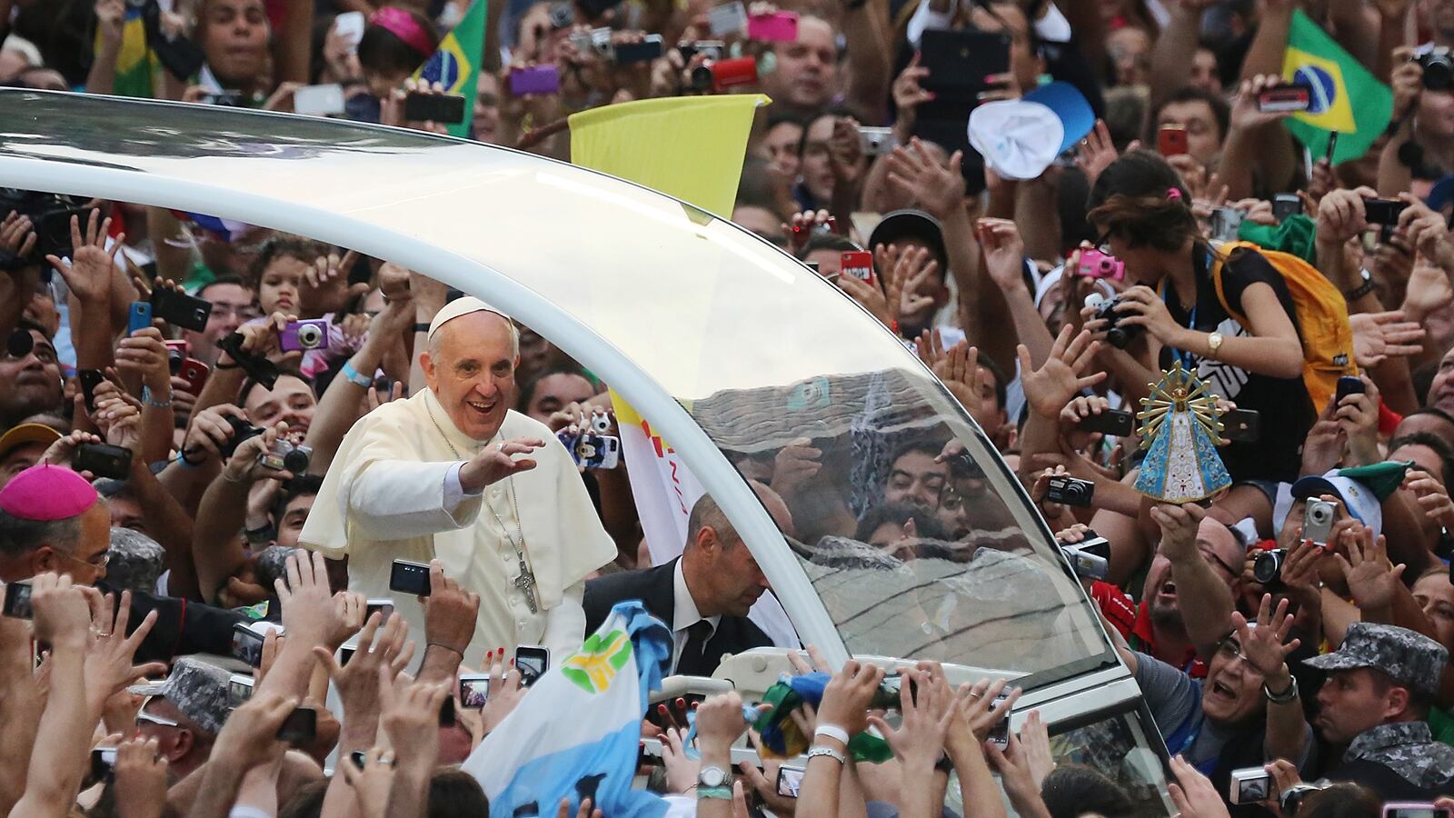 articles/2013/07/26/pope-francis-the-maker-of-traffic-jams/130726-pope-margolis-tease_wo4aw1