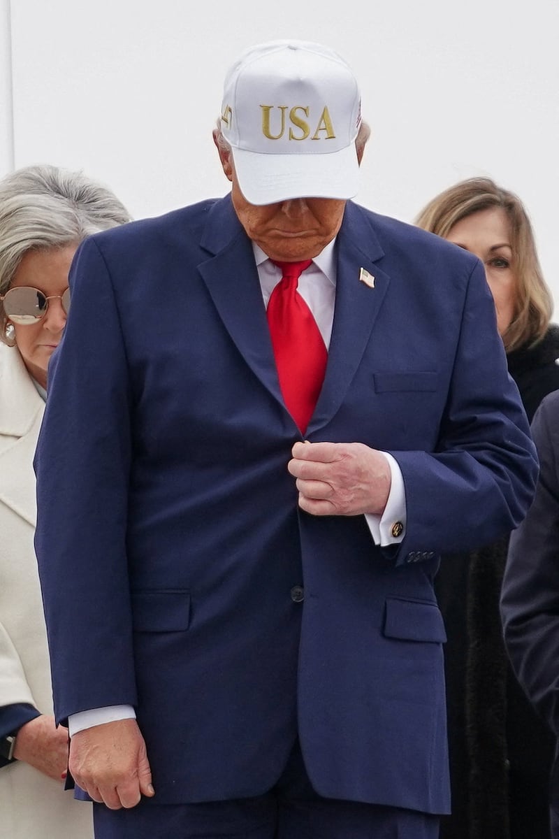 U.S. President Donald Trump participates in a dignified transfer of the remains of six U.S. Army service members of the 103rd Sustainment Command.
