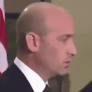 Stephen Miller taking a big sigh as Donald Trump talks about Iran during the Memphis Safe Task Force roundtable in Memphis, Tennessee on March 23, 2026.