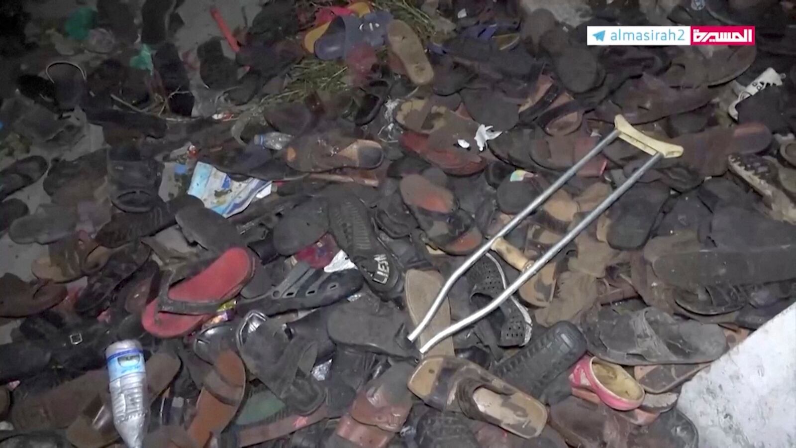 Abandoned shoes on the ground after a stampede in Yemen.
