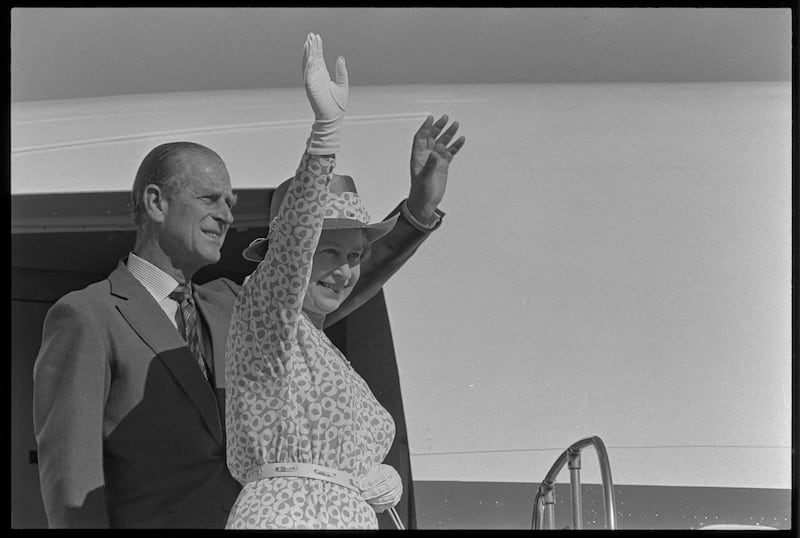 Britain's Queen Elizabeth II and Prince Philip wave goodbye to Adelaide at the airport after completing a two-week visit.  March 13, 1986.
