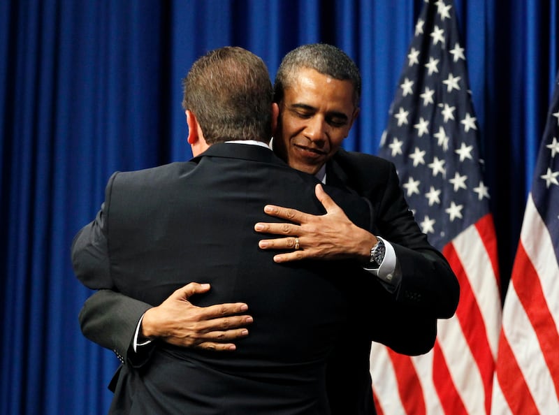 U.S. President Barack Obama is introduced by Stephen Cloobeck, Chairman of Diamond Resorts International, at a Democratic Party fundraiser in Las Vegas, October 24, 2011. Obama will unveil new measures to help struggling homeowners in Las Vegas on Monday in the first leg of a campaign-style swing through western states that may be crucial to his re-election in 2012.  REUTERS/Jason Reed   (UNITED STATES - Tags: POLITICS BUSINESS EMPLOYMENT ELECTIONS)