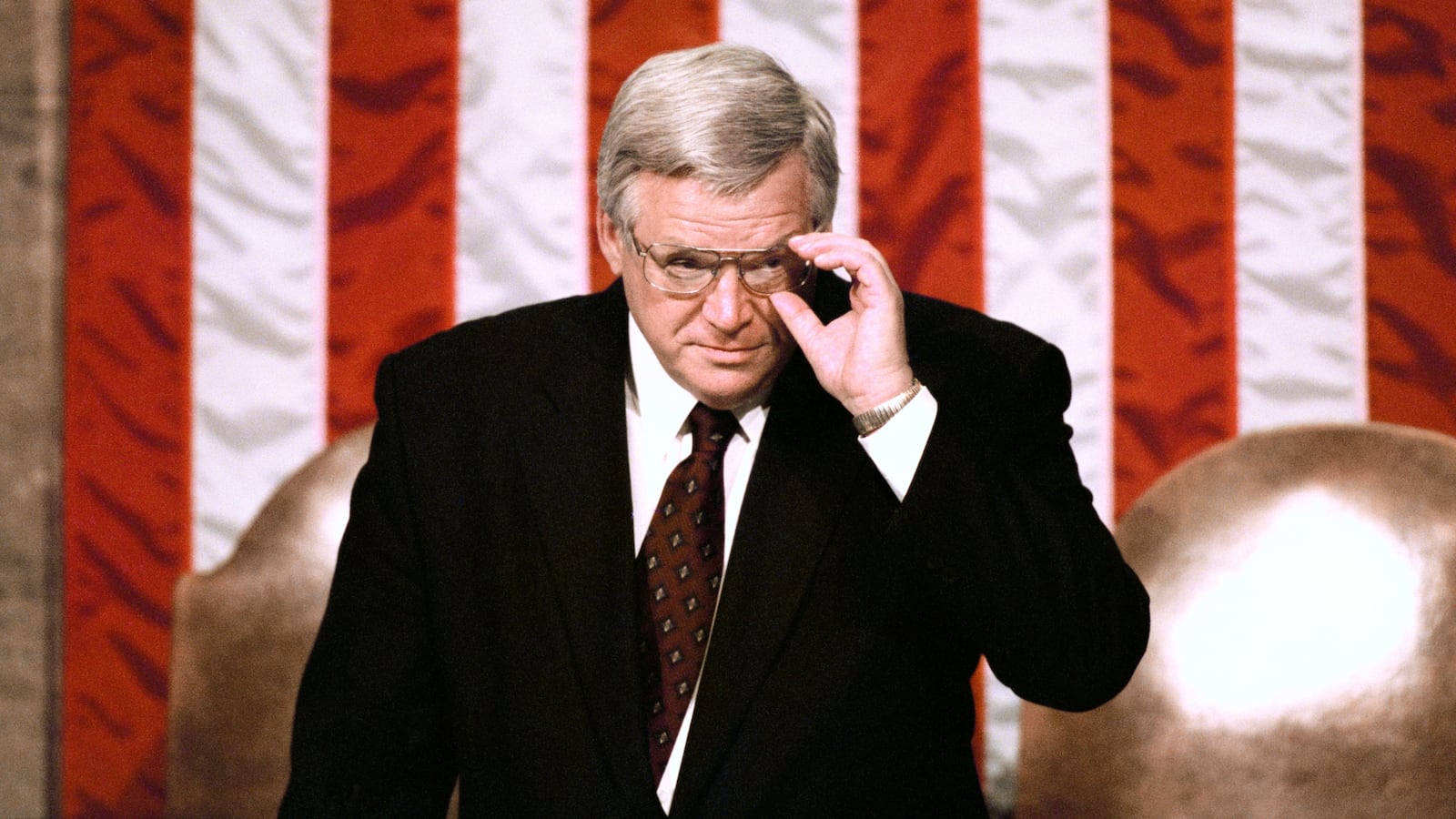 Speaker of the House Dennis Hastert next to his seat in the Congressional Chambers shortly before President Bill Clinton delivers his State of the Union speech before a joint session of Congress on January 20, 1999.