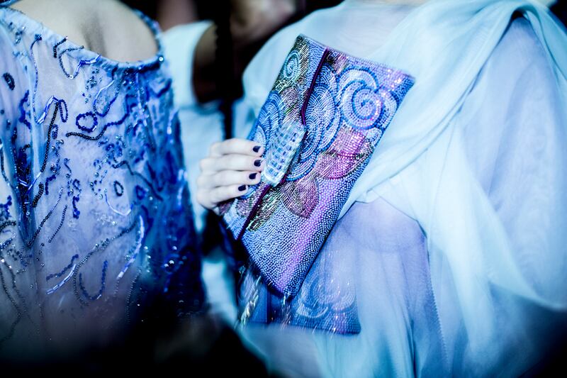 galleries/2013/09/24/backstage-at-giorgio-armani-spring-summer-2014-photos/130923-tachman-milan9_zikxs9
