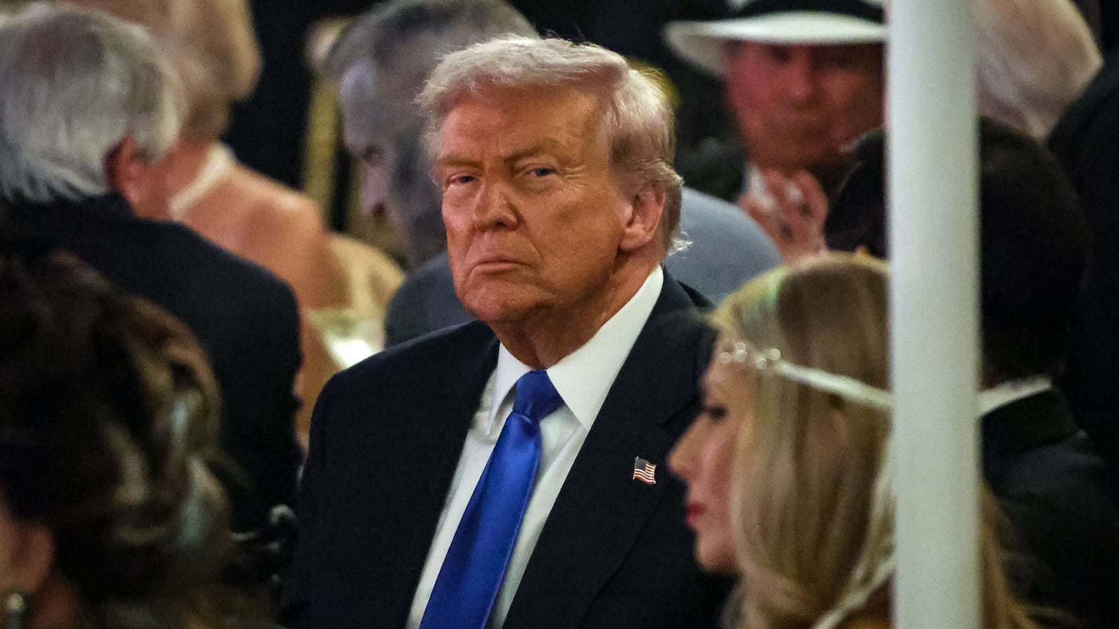 PALM BEACH, FLORIDA - OCTOBER 31: US President Donald Trump talks with guests during a Halloween party at his Mar-a-Lago estate on October 31, 2025 at Palm Beach, Florida. Trump is spending the weekend at his Mar-A-Lago estate in Palm Beach, Florida. (Photo by Samuel Corum/Getty Images)