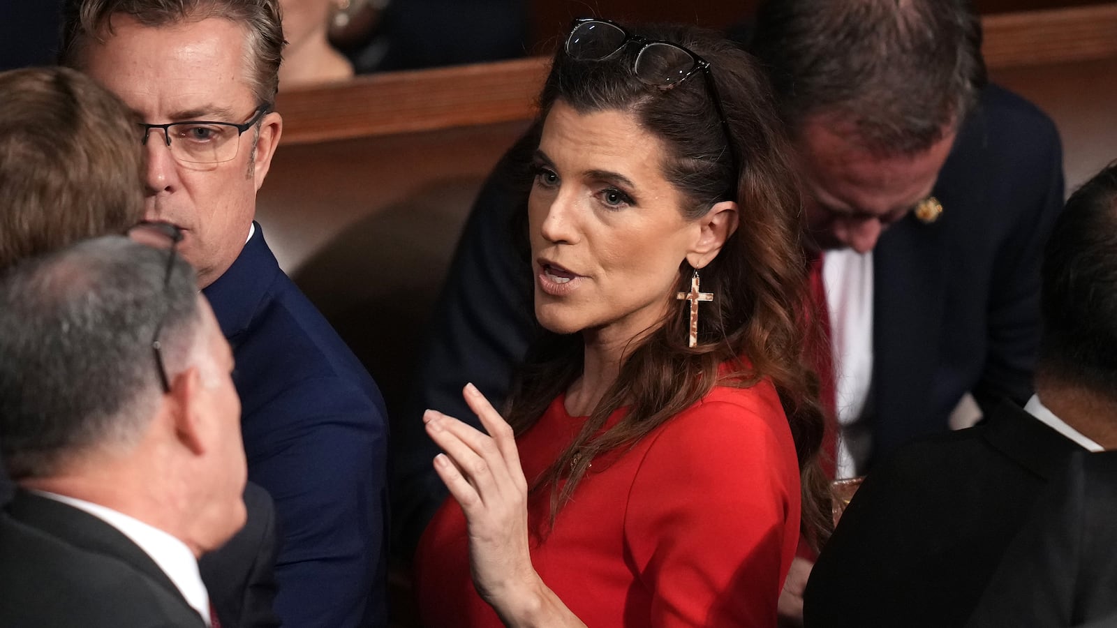 Rep. Nancy Mace (R-SC) (R) talks with Rep. Andrew Clyde (R-GA) as the House votes for a Speaker of the House on the first day of the 119th Congress in the House Chamber of the U.S. Capitol Building on January 03, 2025 in Washington, DC. Rep. Mike Johnson (R-LA) is working to retain the Speakership in the face of opposition within his own party as the 119th Congress holds its first session to vote for a new Speaker of the House.
