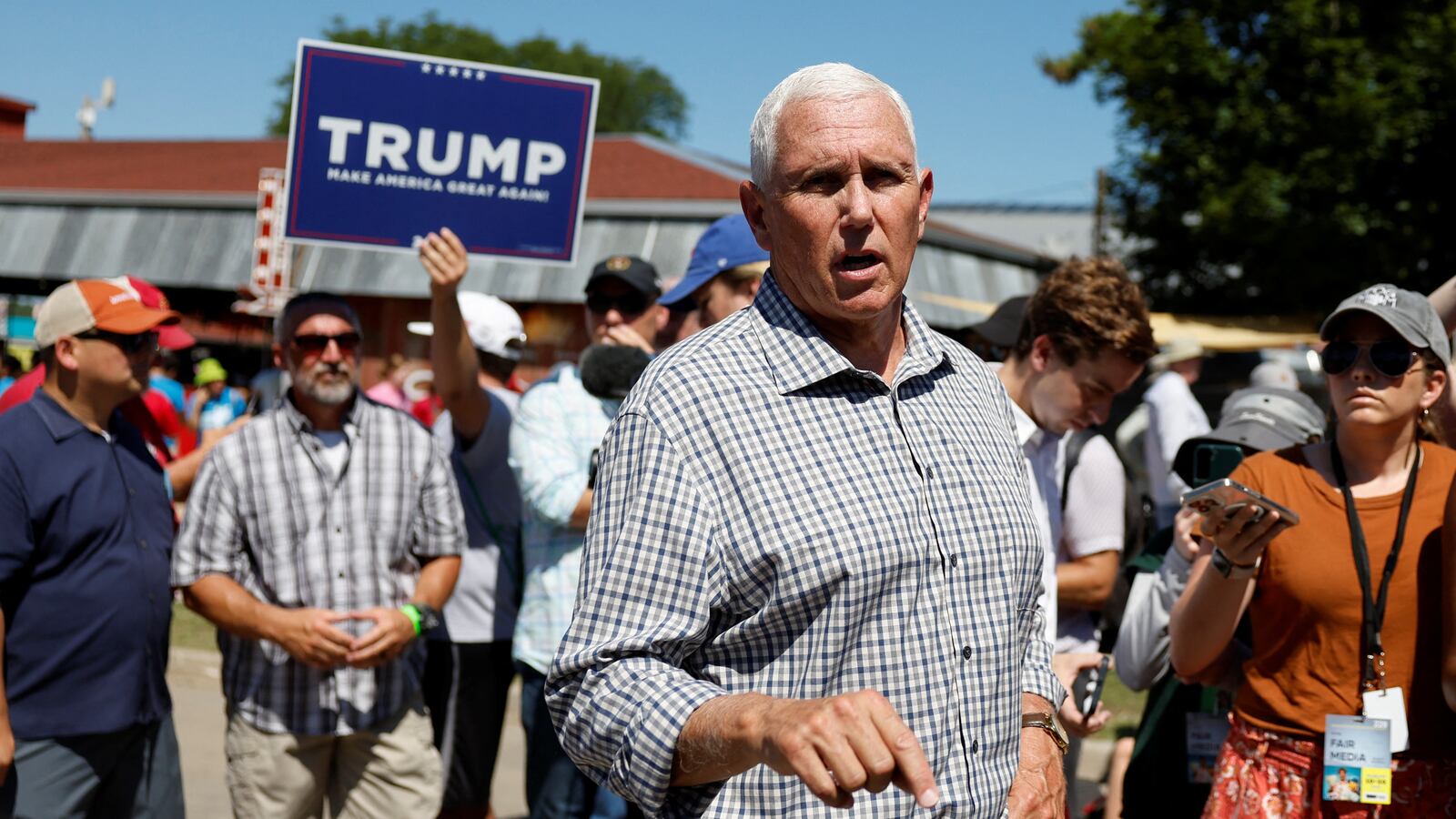 Mike Pence, one of the participants in the first GOP primary debate, campaigns for the 2024 Republican presidential nomination at the Iowa State Fair in Des Moines, Iowa, Aug. 11, 2023.