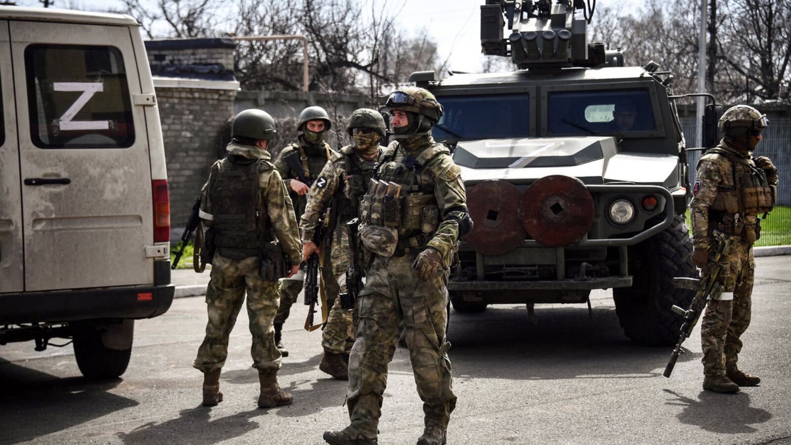 Russian soldiers patrol a street in Volnovakha in the Donetsk region.
