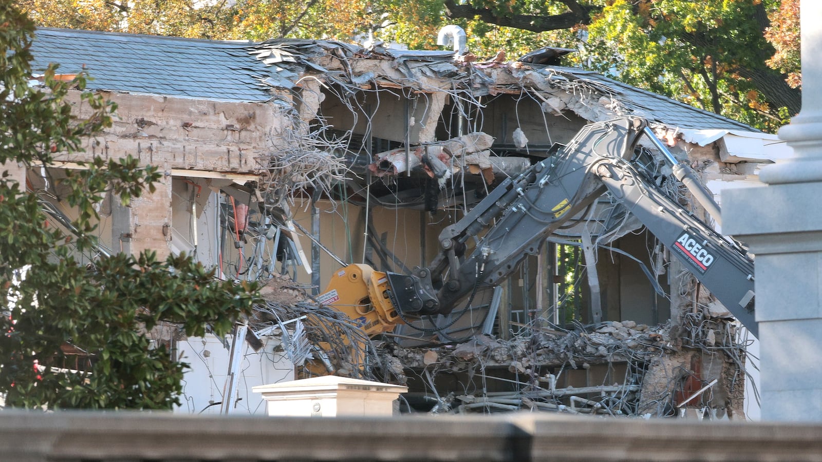 Workers demolish the facade of the East Wing of the White House on Oct. 20, 2025 in Washington, DC. The demolition is part of U.S. President Donald Trump's plan to build a ballroom reportedly costing $250 million on the eastern side of the White House.