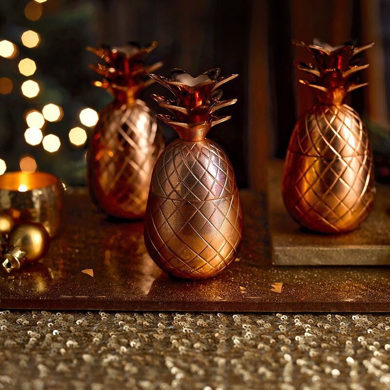 articles/2016/12/06/spirited-holiday-gifts-for-everyone-on-your-list/161205-rothbaum-gift-guide-embed-Elyx-Boutique-3-Mini-Pineapples_r2np2y