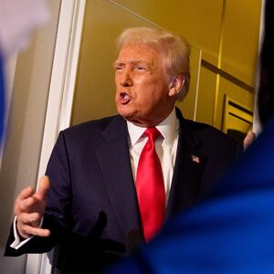 President Donald Trump speaks to members of the media aboard Air Force One on October 30, 2025 in flight. Trump is returning to Washington following a high-stakes meeting with Chinese President Xi Jinping, alongside securing trade deals with ASEAN, Japanese and South Korean partners on his week-long Asian tour.