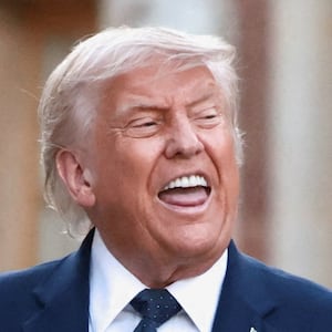U.S. President Donald Trump is welcomed by French President Emmanuel Macron and his wife Brigitte Macron ahead of a dinner commemorating the 250th anniversary of the United States' independence, at the Palace of Versailles, near Paris, France, June 17, 2026.