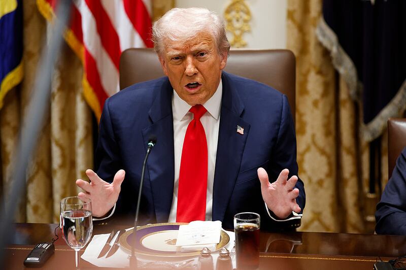 U.S. President Donald Trump speaks during a meeting with President of Argentina Javier Milei in the Cabinet Room at the White House on October 14, 2025 in Washington, DC. Trump is hosting Milei for a working lunch days after the U.S.