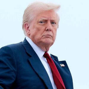President Donald Trump boards Air Force One on August 1, 2025 at Joint Base Andrews, Maryland.