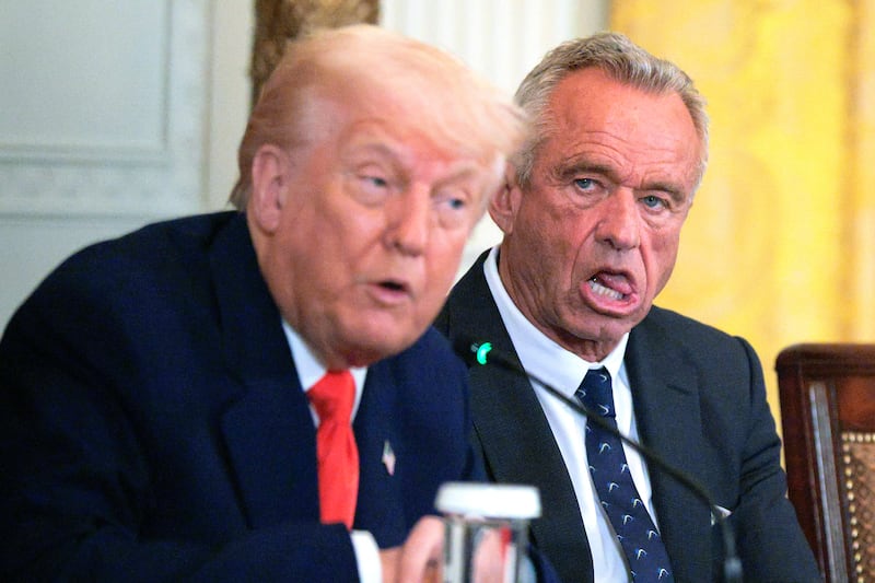 U.S. President Donald Trump and Health and Human Services Secretary Robert F. Kennedy Jr. attend an event introducing a new Make America Healthy Again