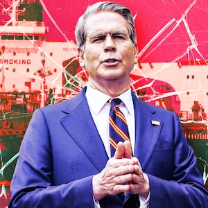 A photo illustration of United States Secretary of the Treasury Scott Bessent in front of oil tankers.