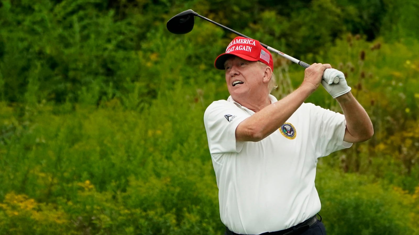 Donald Trump plays golf during the Official Pro-Am Tournament ahead of the LIV Golf Invitational Series event at Trump National Golf Club Bedminster in Bedminster, New Jersey, on August 10, 2023.