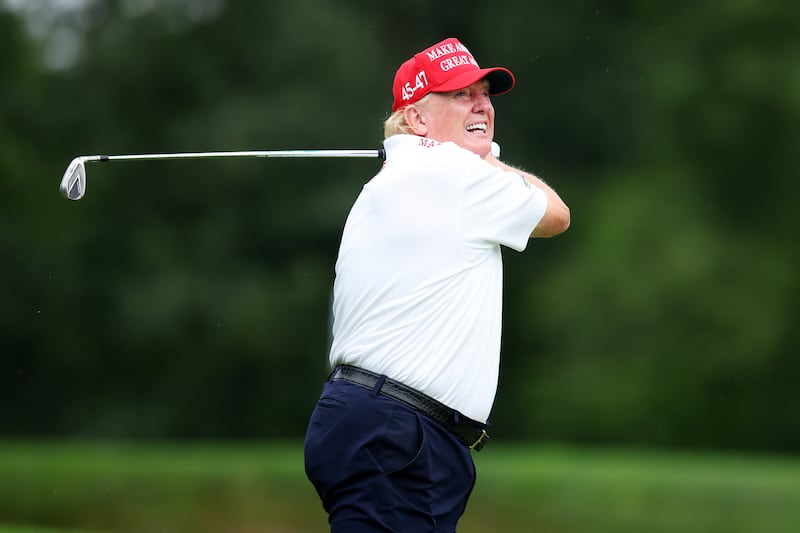 BEDMINSTER, NEW JERSEY - AUGUST 10: Former President Donald Trump follows his tee shot on the 3rd tee during the pro-am prior to the LIV Golf Invitational - Bedminster at Trump National Golf Club on August 10, 2023 in Bedminster, New Jersey. (Photo by Mike Stobe/Getty Images)