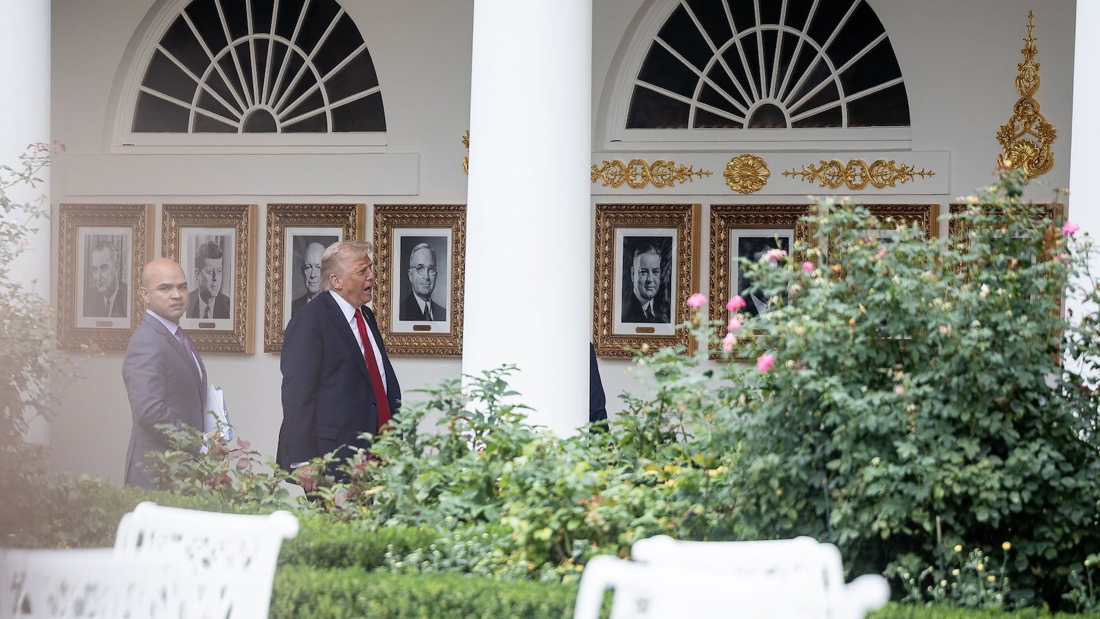 President Donald Trump examines the recently unveiled Presidential Walk of Fame as he walks through the Rose Garden of the White House in Washington, DC, on Sept. 30, 2025.