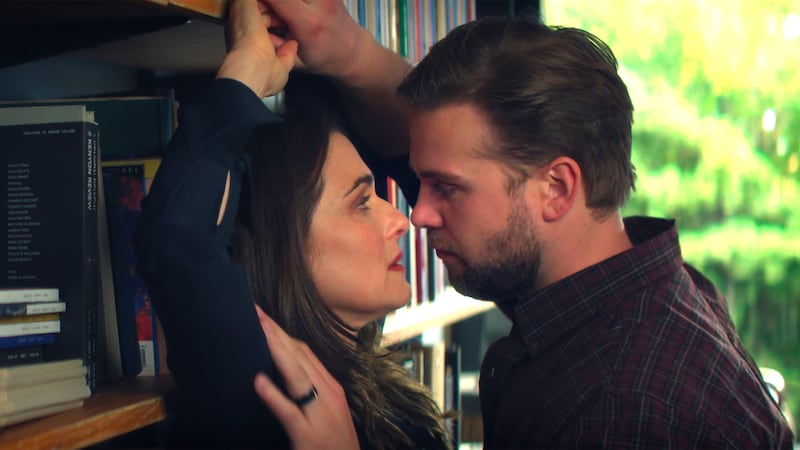 (L-R) Rachel Weisz as The Protagonist and Leo Woodall as Vladimir.