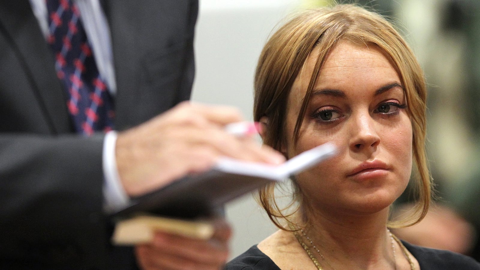 articles/2013/03/18/lindsay-lohan-due-in-court-for-allegedly-lying-to-cops-over-car-crash/130317-lohan-court-klassen-tease_pcnzys