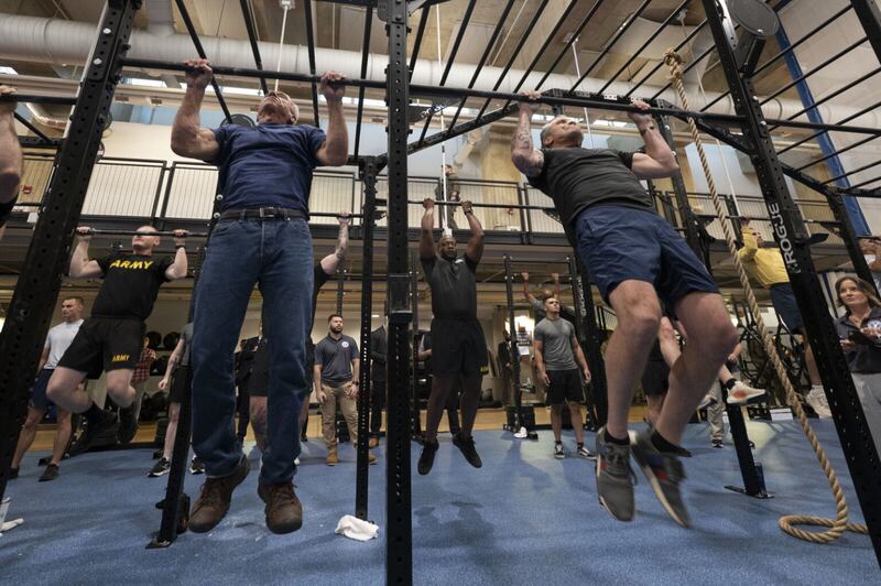 Robert F. Kennedy Jr. wearing a pair of jeans as he works out alongside Pete Hegseth for their MAHA fitness challenge.