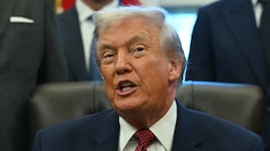 US President Donald Trump makes an announcement from the Oval Office of the White House in Washington, DC on December 3, 2025. President Trump announced weaker fuel efficiency standards for the country, as part of his agenda to lower the price of gasoline-powered cars. (Photo by ANDREW CABALLERO-REYNOLDS / AFP via Getty Images)
