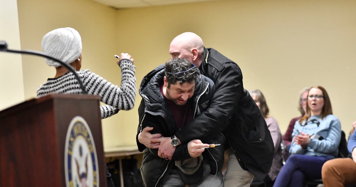 Trump Enemy Sprayed With Mystery Liquid in Town Hall Attack