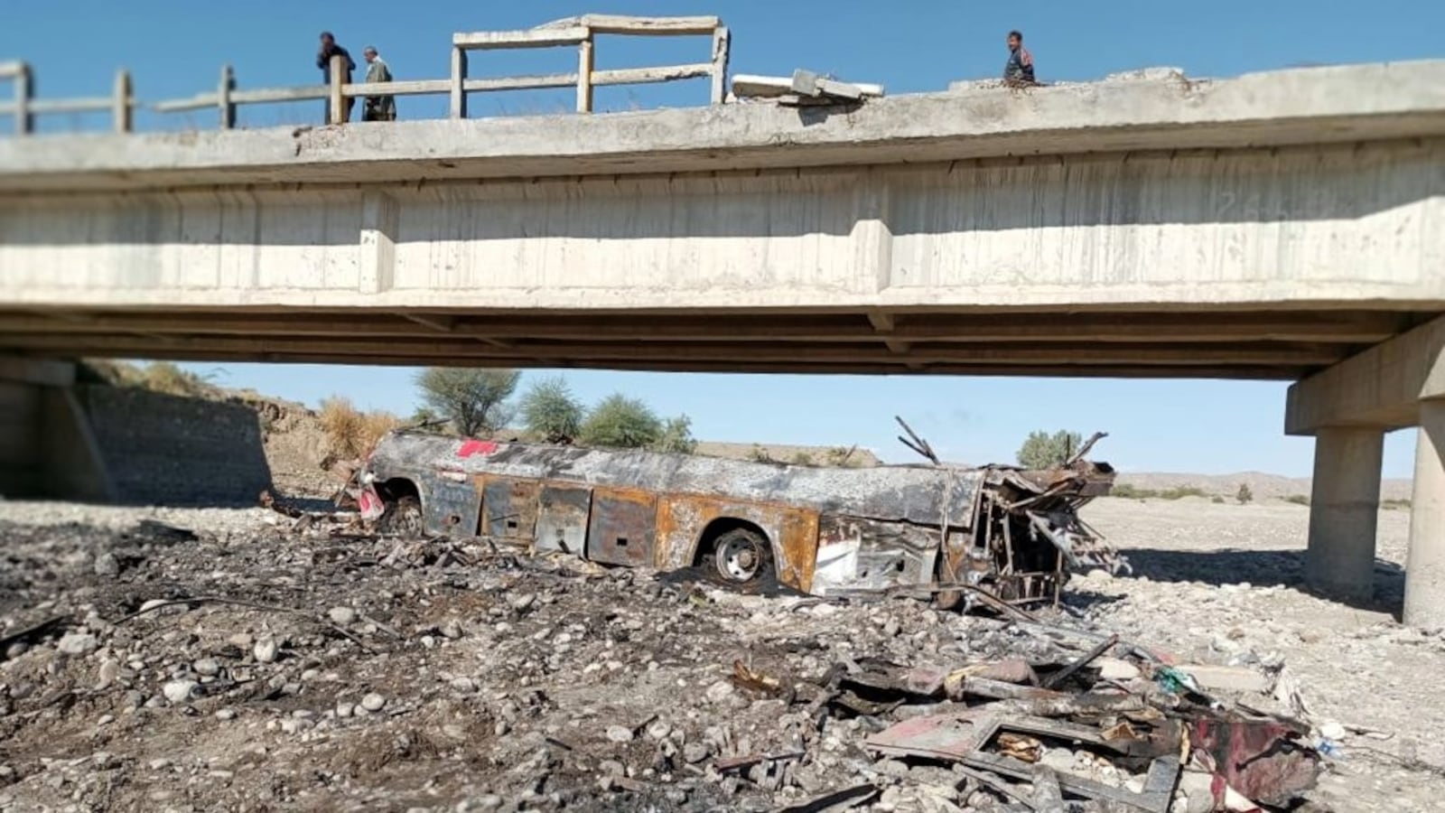 A burnt passenger bus at the accident site in Lasbela district of Pakistan's southwestern Balochistan province on Jan. 29, 2023.