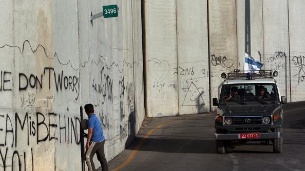 articles/2012/10/16/anti-zionists-against-anti-semitism/wall-soccer-openz_rjsuqy