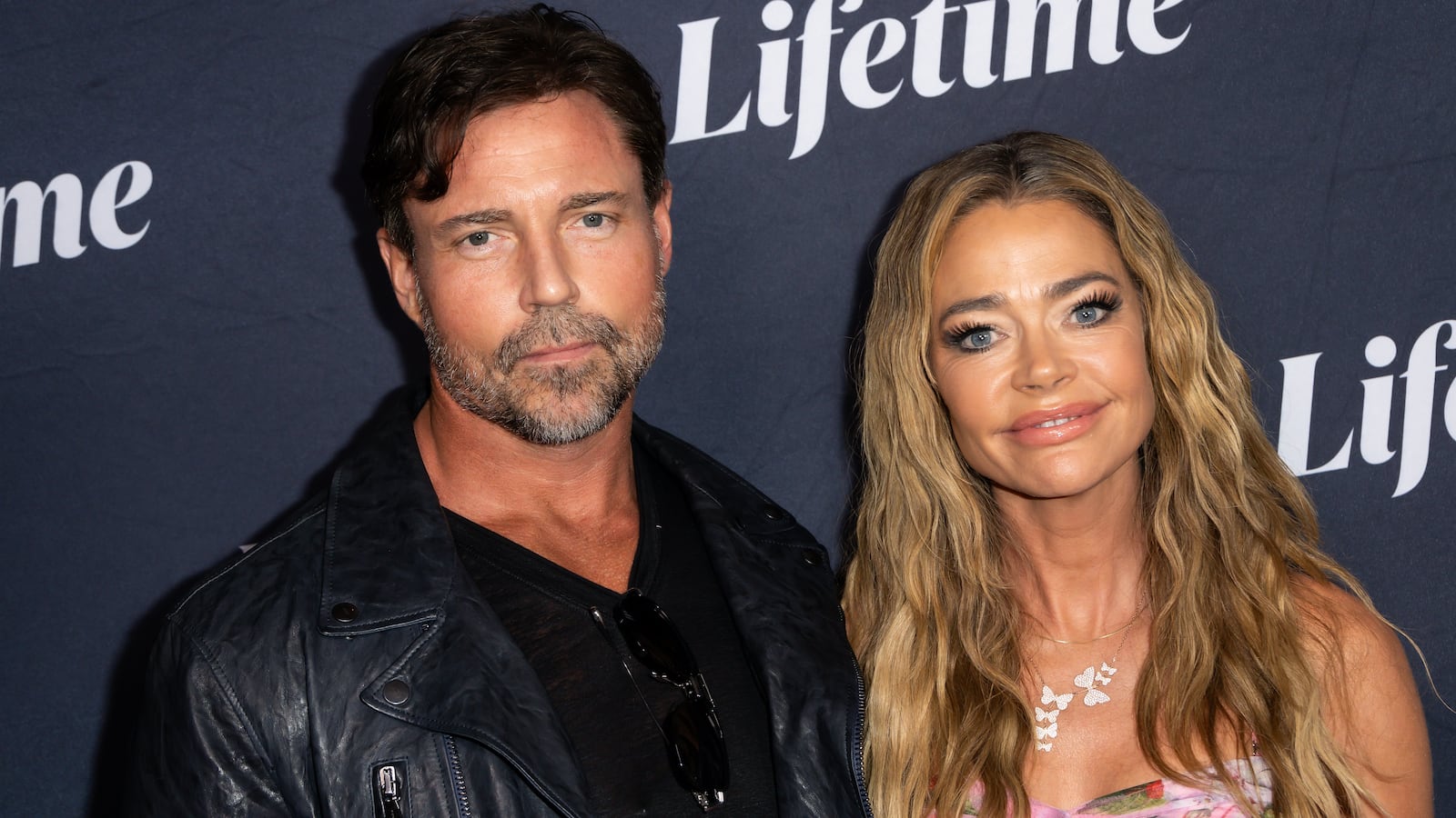 Denise Richards (right) and Aaron Phypers (left)