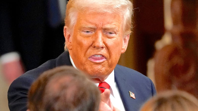 U.S. President Donald Trump gestures during an event to sign an executive order to shut down the Department of Education, in the East Room at the White House in Washington, D.C., U.S., March 20, 2025.