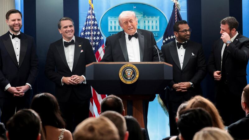 President Donald Trump speaks next to Federal Bureau of Investigation (FBI) Director Kash Patel, acting Attorney General Todd Blanche, Vice President JD Vance and Homeland Security Secretary Markwayne Mullin at a press briefing at the White House, following a shooting incident during the annual White House Correspondents’ Association dinner, in Washington, D.C., on April 25, 2026.