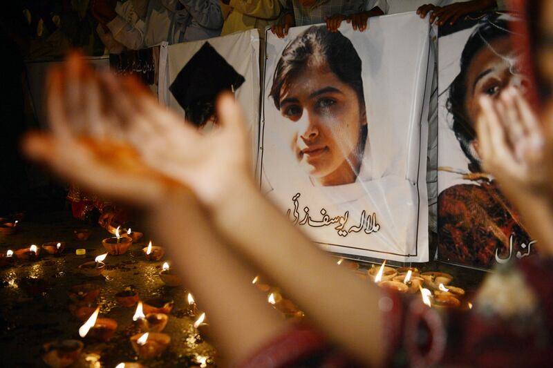 articles/2012/10/12/will-malala-yousafzai-s-shooting-be-pakistan-s-rosa-parks-moment/malala-rosa-parks-rezvi_lgikwt