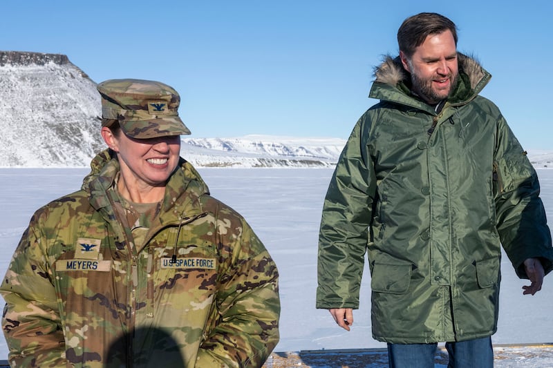 US Vice President JD Vance walks with Col. Susan Meyers (L), commander of the US military's Pituffik Space Base, as they tour the base in Greenland on March 28, 2025.