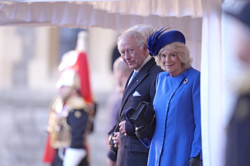King Charles III and Queen Camilla attend a ceremonial welcome at Windsor Castle during day one of a state visit by German President Frank-Walter Steinmeier on December 3, 2025.