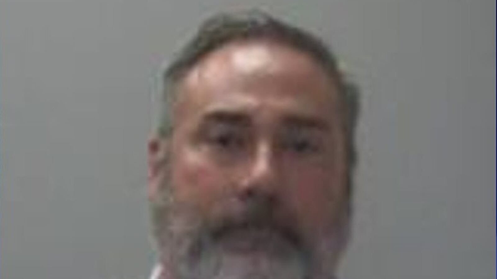 A mugshot of David Cole