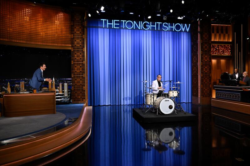 THE TONIGHT SHOW STARRING JIMMY FALLON -- Episode 2179 -- Pictured: (l-r) Host Jimmy Fallon watches as actor & comedian Fred Armisen plays drums during their interview on Monday, September 8, 2025 -- (Photo by: Todd Owyoung/NBC via Getty Images)