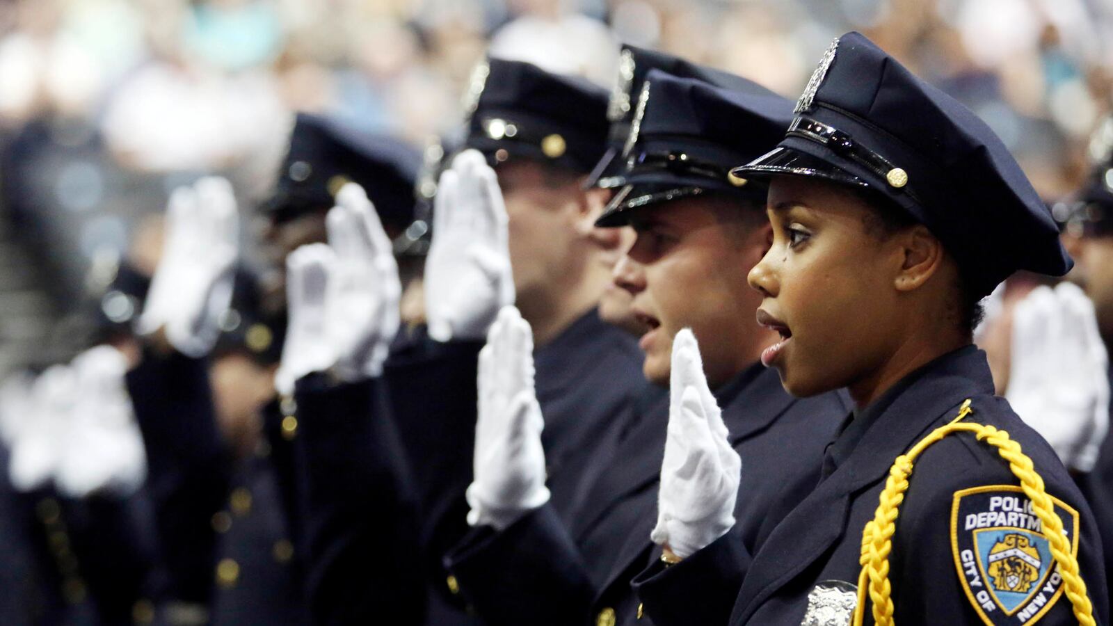 articles/2013/07/03/nypd-s-new-cops-sworn-in-at-brooklyn-s-barclays-center/130702-police-graduation-new-york-tease_nhd88e
